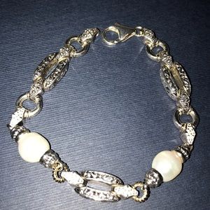 Sterling, 14kt and diamond bracelet.